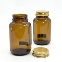 Bouteille en verre ambré avec bouchon à vis en aluminium et couvercles métalliques pour comprimés et capsules, avec scellage par induction thermique – Approvisionnement direct usine