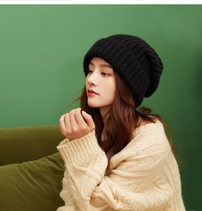 Bonnet tricoté en acrylique chaud de bonnet unisexe <span class=keywords><strong>d</strong></span>'hiver de couleur pure avec tuque de protection <span class=keywords><strong>d</strong></span>'oreille solide de Pom - Product Image 2