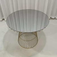 Table à manger ronde en acier inoxydable doré avec plateau en verre miroir
