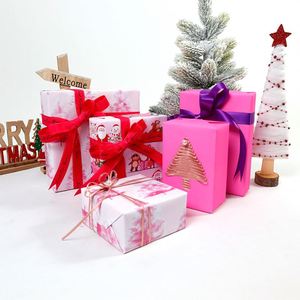 Venta al por mayor de alta calidad 80g 43*300cm papel de embalaje rosa de Navidad papel de regalo - Product Image 1