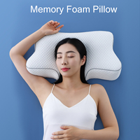 Oreiller orthopédique moderne en mousse à mémoire de forme avec fonctions de massage rafraîchissant pour soulager les douleurs cervicales, option de logo personnalisé, design ergonomique