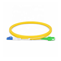Kabel Patch Fiber Optik Single Mode OS2 2 Serat LC UPC ke SC APC Duplex Tight-Buffered OFNR Jumper Cable 2.0MM