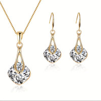 Ensemble collier et boucles d'oreilles géométriques tendance - Style goutte luxueux avec une touche haut de gamme et un attrait polyvalent