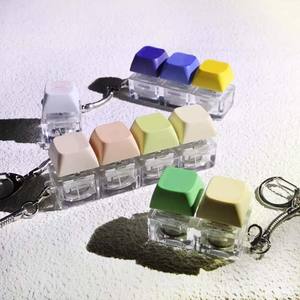 カスタムロゴ アニメスタイル 発光 ストレス解消スイッチ プラスチック キーキャップ ボタン フィジェットクリッカー キーホルダー 販促用ギフト 記念品 - Product Image 5