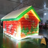 Expédition rapide par avion jusqu'à votre porte, nouvelle conception de maison de Noël 2026, cabane gonflable de Père Noël avec éclairage LED pour la décoration de Noël