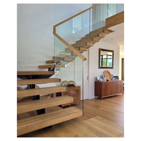 Escalier en colimaçon moderne Prima 034 pour intérieur, garde-corps en verre, construction en acier inoxydable et aluminium, composants en bois massif, respectueux de l'environnement