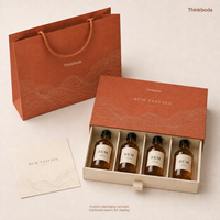 Coffret cadeau de dégustation de rhum personnalisé, quatre mini-bouteilles, emballage tiroir avec séparateurs en carton, ruban de tirage pour échantillonnage de marque