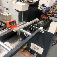 Machine de fraisage et de perçage CNC automatique à double tête pour quincaillerie de fenêtres et de portes