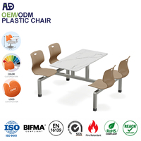 Ensemble table et chaises de cantine en PP avec structure métallique et sièges connectés pour salle scolaire