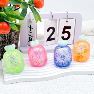 Jouet anti-stress pour enfants à rebond lent, mini-radis à presser quatre couleurs, à paillettes de maltose, thème Pâques - Product Image 3