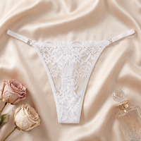 Culotte string en nylon tricoté blanc à dentelle florale pour femme, transparente, à fines bretelles, sexy, respirante, taille basse, vente en gros, OEM ODM
