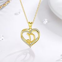 Collar de Moda - Collar de Cobre con Inicial y Colgante de Corazón Calado, un Elegante Accesorio para Mujer