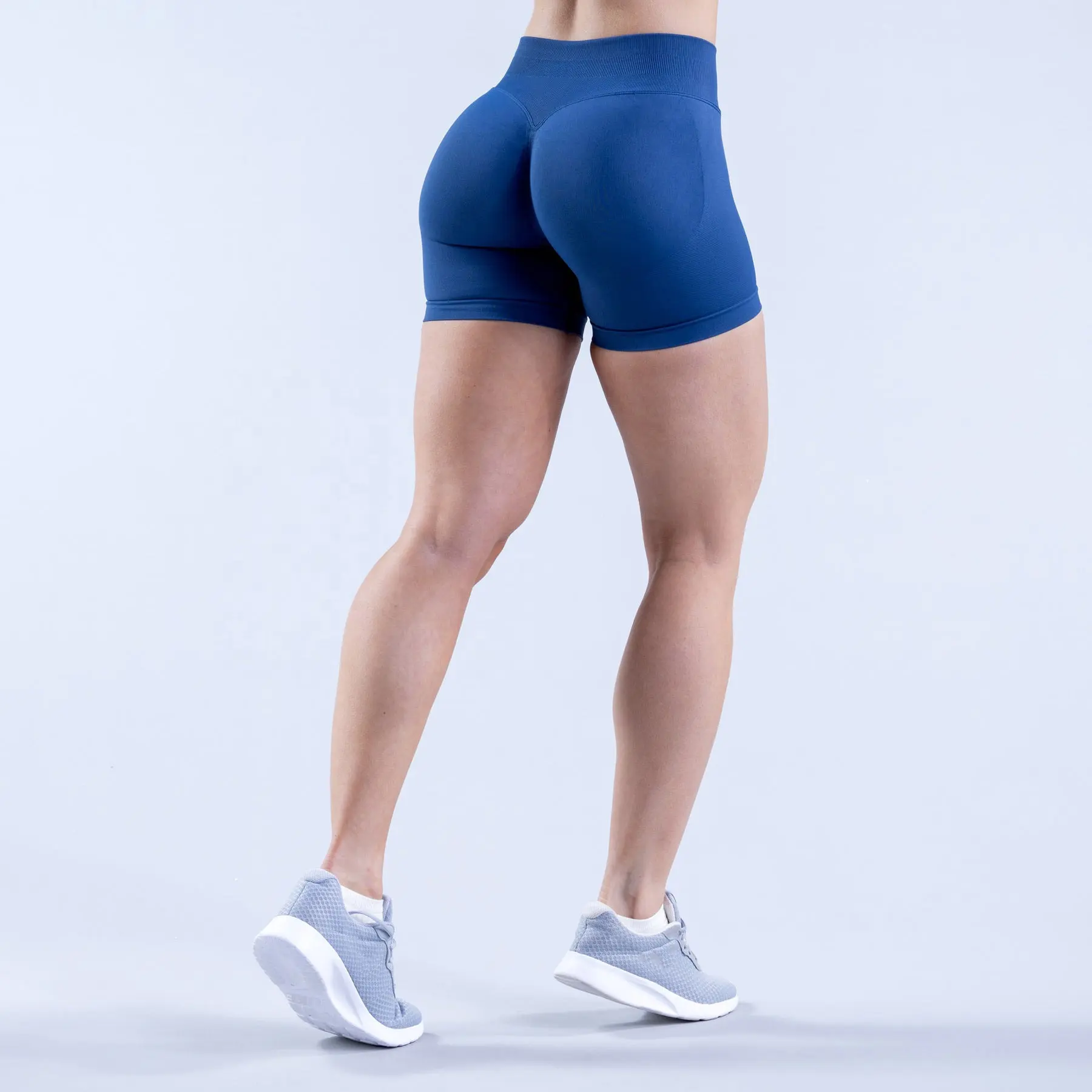 Pantaloncini da corsa senza cuciture elasticizzati a compressione a vita alta da donna