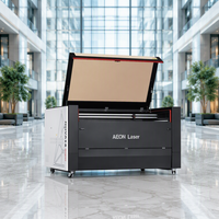 Machine de découpe laser CO2 professionnelle AEON NOVA - Haute précision, haute productivité, commande CNC, refroidissement par eau, tube 90W/100W/130W