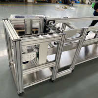 Convoyeur à chaîne à double vitesse pour ligne de production d'assemblage automatisé électronique à faible bruit avec engrenage de transfert automatique de palettes à rouleaux