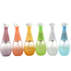 Nouveau design de bouteille de parfum de luxe bouteille de parfum en verre avec logo personnalisé et décoration à pompon en couleur - Product Image 5