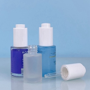 Luxury Round Skin Care Serum Press Top <b>Dropper</b> <b>Bottles</b> Blue 1oz 30ml Glass <b>Bottle</b> With Push Botton - Product Image 2