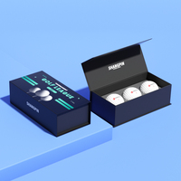 Vente en gros de boîte-cadeau de golf magnétique en papier noir de luxe boîte d'emballage de balle de golf de stratification brillante à couvercle rabattable avec insert en mousse
