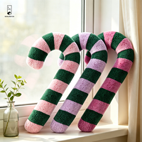 Coussin de Noël en polyester patchwork en forme de canne à sucre avec rayures vertes et roses, effet 3D
