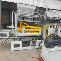 Machine automatique hydraulique QT4-15 pour la fabrication de blocs de béton, de briques creuses, pleines et de pavés autobloquants pour la construction