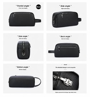 Pochette de voyage en cuir PU pour homme, sac à main d'affaires, pochette antivol, mode, avec serrure à code, grande capacité, dragonne, fermeture éclair, portable