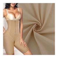 Tissu en maille extensible de haute qualité 75 Nylon 25 Spandex à séchage rapide nu 4 voies pour Leggings façonnant la taille