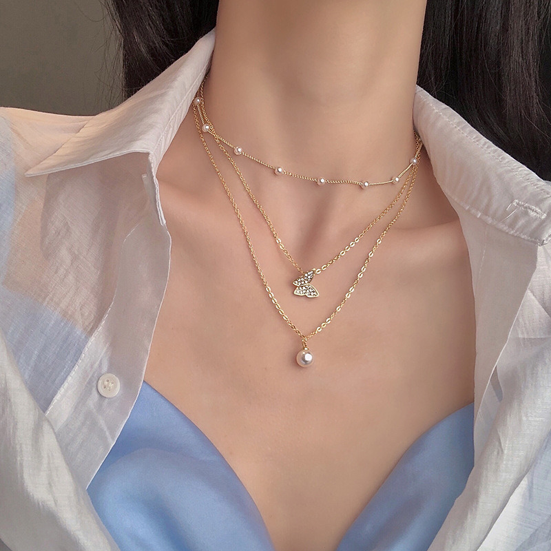 Shop Our Trendy Multilayered Necklaces with Shiny Pearls