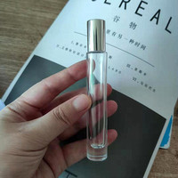 Flacons de parfum ronds de 10 ml, boîte d'emballage avec bille roulante en acier pour huile essentielle, flacon vide pour cosmétiques de voyage