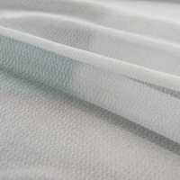 100% polyester, adhésif élastique, fusible, extensible, tricoté en chaîne, doux, pour vêtements, entoilage en rouleau enduit de PES