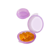 Boîte à pilules ronde en plastique portable avec pot à charnière rabattable pour un stockage pratique
