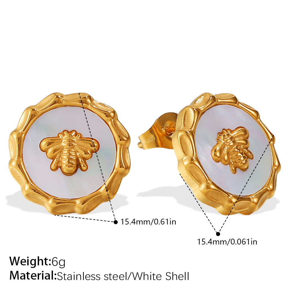 Boucles d'oreilles à tige en or et coquillage blanc EH507G