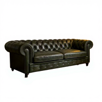 Canapé trois places de style américain vintage Chesterfield en cuir véritable, rétro, nostalgique, avec détails à languettes, finition huilée