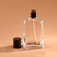 Bouteille d'huile essentielle en verre bouclé de forme de luxe vide au design unique Bouteille d'eau parfumée avec couvercle noir