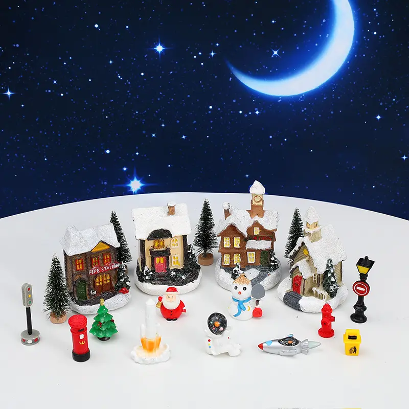 Nouvelle décoration de Noël maison de neige lumineuse petite maison européenne village astronaute série 16 pièces ensemble