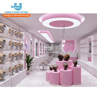 Présentoir à perruques en acier inoxydable doré personnalisé présentoir à extensions de cheveux humains meubles de salon rose tendance boutique design d'intérieur