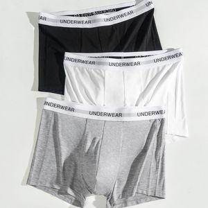 Calzoncillos bóxer cómodos de algodón transpirable para hombre, ropa interior de cintura media con logotipo personalizado de fábrica al por mayor - Product Image 1