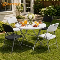 Tables pliantes en plastique portables et chaises empilables en métal pour un rangement facile