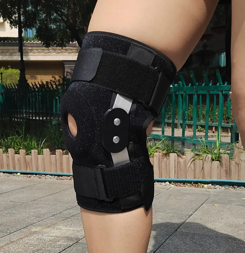2023 vendita calda nero traspirante regolabile personalizzato sport aperto supporto per ginocchio rotula per alleviare il dolore al ginocchio