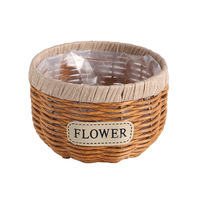 Panier de couverture de pot de plante en rotin imitation avec bord enveloppé pour le rangement des plantes vertes sur le bureau