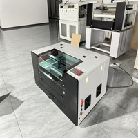 JingKe 2024 la dernière machine de gravure laser co2 50W 60W 80W 100W 6040 pour bois acrylique avec système Ruida M3