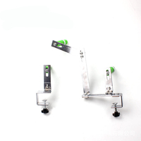 Pièces de rechange pour machine à coudre surjeteuse : Cadre de tirage arrière en métal argenté avec support de bande élastique extensible