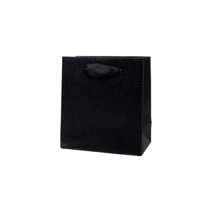 Fabrication de sacs de transport kraft réutilisables faits à la main - Product Image 1