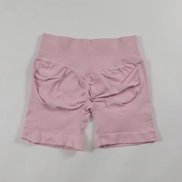 Short de yoga uni sans coutures avec effet froncé aux fesses, dos en V, taille basse côtelée, haute élasticité, pour la gym, la course et l'entraînement, effet galbe fessier