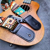 Loopers de sangle de guitares en cuir d'usine chinoise pour pièces et accessoires d'instruments à cordes d'ukulélé et de guitare