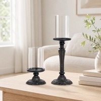 Bougeoir vintage sculpté en métal orné avec manchon en verre transparent