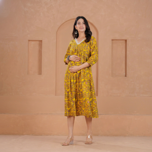 Mustard Floral Print Cotton V-Neck <b>Three</b> Quarter Sleeve Casual Fit Flare Midi Dress Maternity Feeding Gown Pockets Daily Wear - Product Image 1