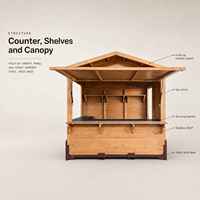 Kiosque pliant en bois pour stand alimentaire de Noël, utilisation événementielle ou en marché.