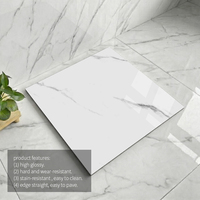 Carrelage de sol en porcelaine polie blanche 600*600mm, motif marbre, résistant à la décoloration, pour salle de bain de villa