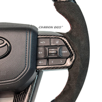 Volant en cuir perforé noir en fibre de carbone pour Toyota LC300 Cruise GR Volant de voiture Sport LED Style Factory Direct