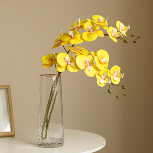 Vente chaude Décoration intérieure Fleurs d'orchidée artificielles en silicone à 7 têtes au toucher réel en gros pour la décoration de mariage et de salon - Product Image 2